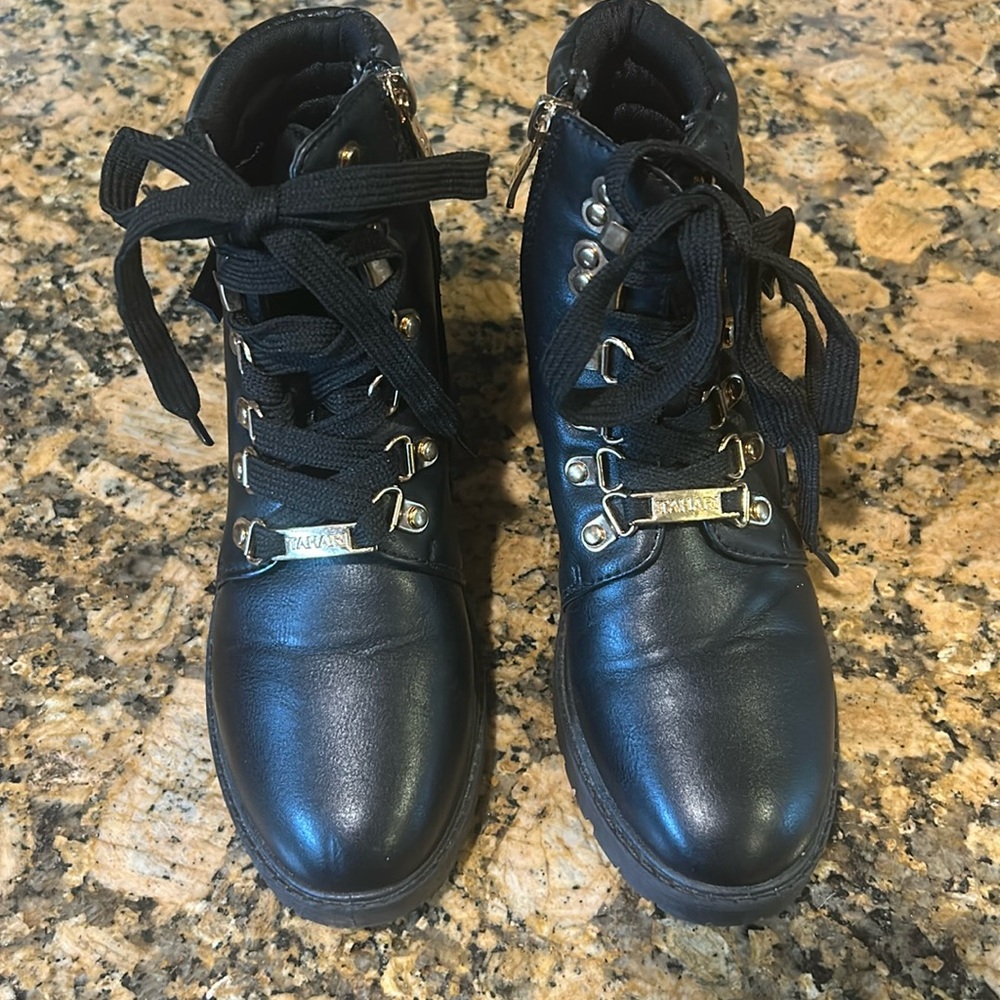 TAHARI lace up Combat boots.